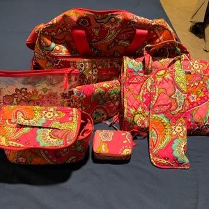 Vera Bradley travel bag set.